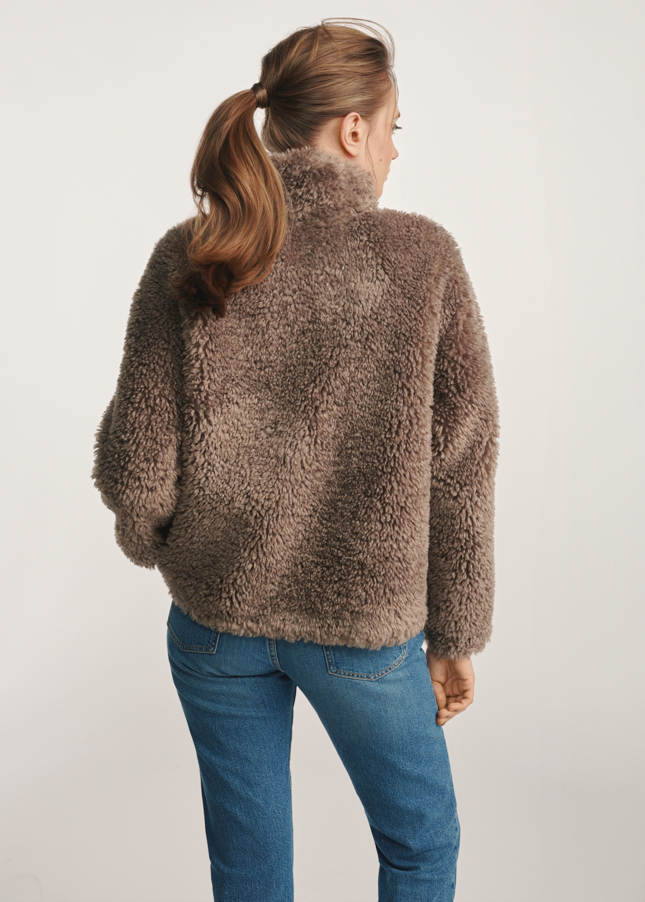 Women's ash-gray fur coat FUTDP-0021B-93(Z25), back view of the product on the model. Half of the silhouette visible.