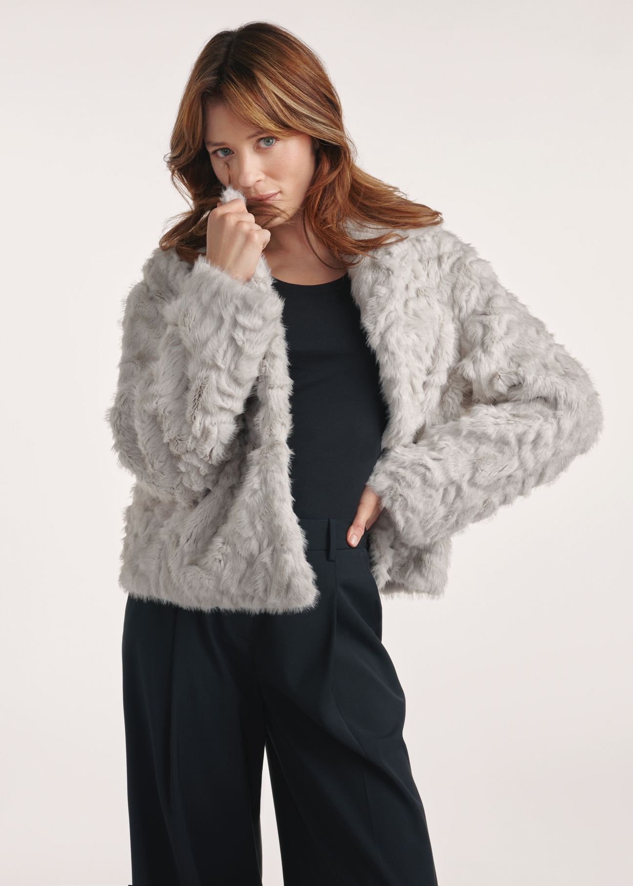 Gray women's fur coat FUTDP-0058-91(Z25), product photo from the front on the model, half of the silhouette visible.