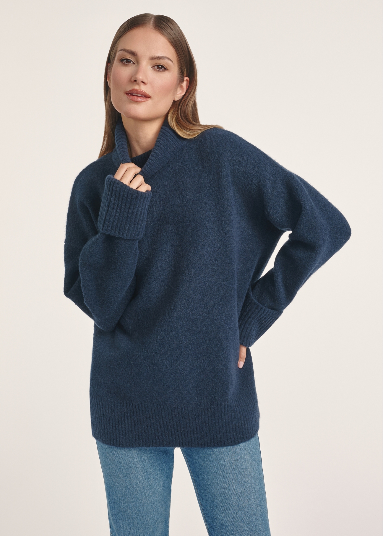Navy blue women's turtleneck SWEDT-0249-68(Z25), product visible from the front on the model, half of the silhouette visible.