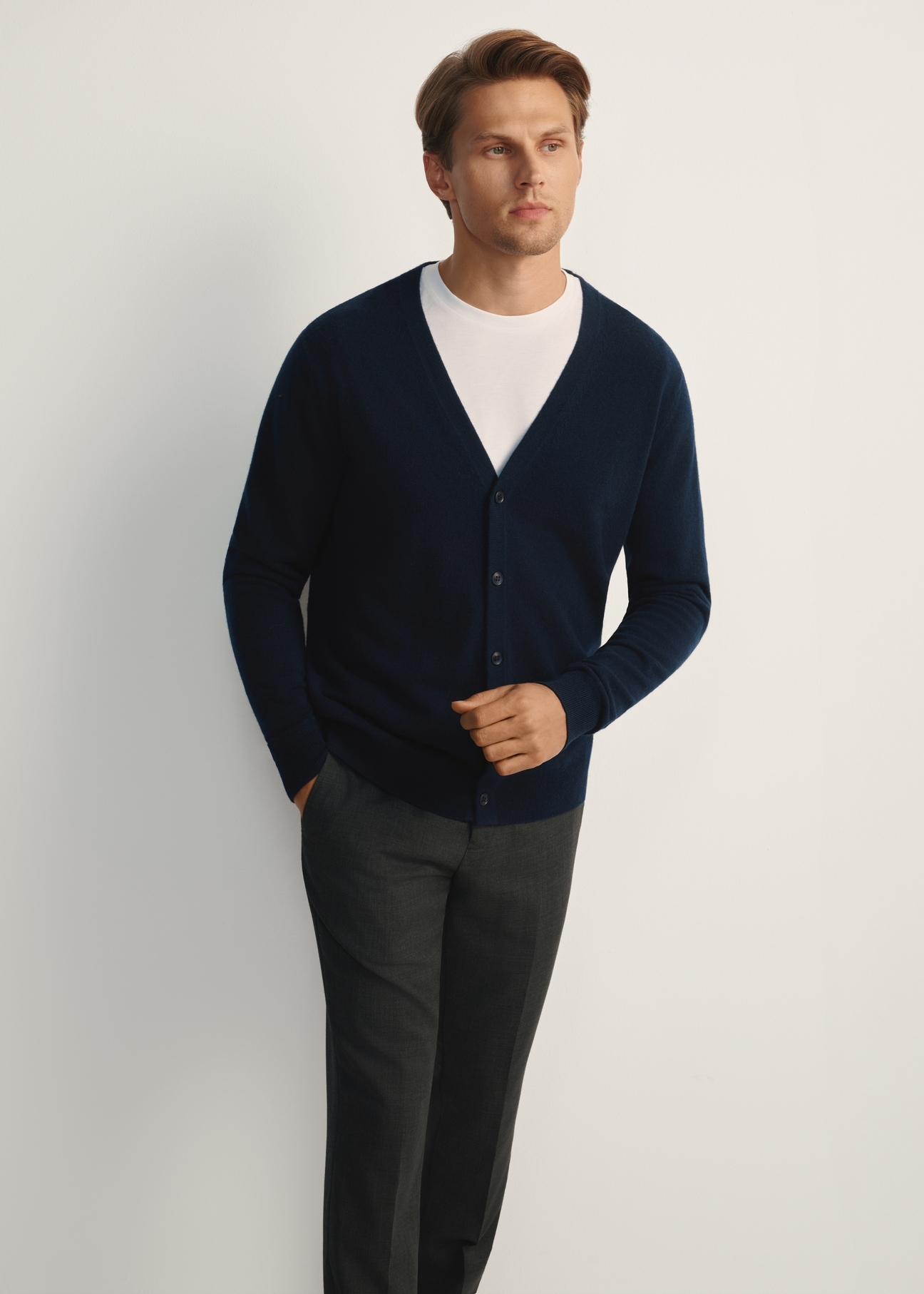 Navy blue men's wool cardigan with cashmere KARMT-0005-68(Z25), front view of the product on the model, half of the silhouette visible.
