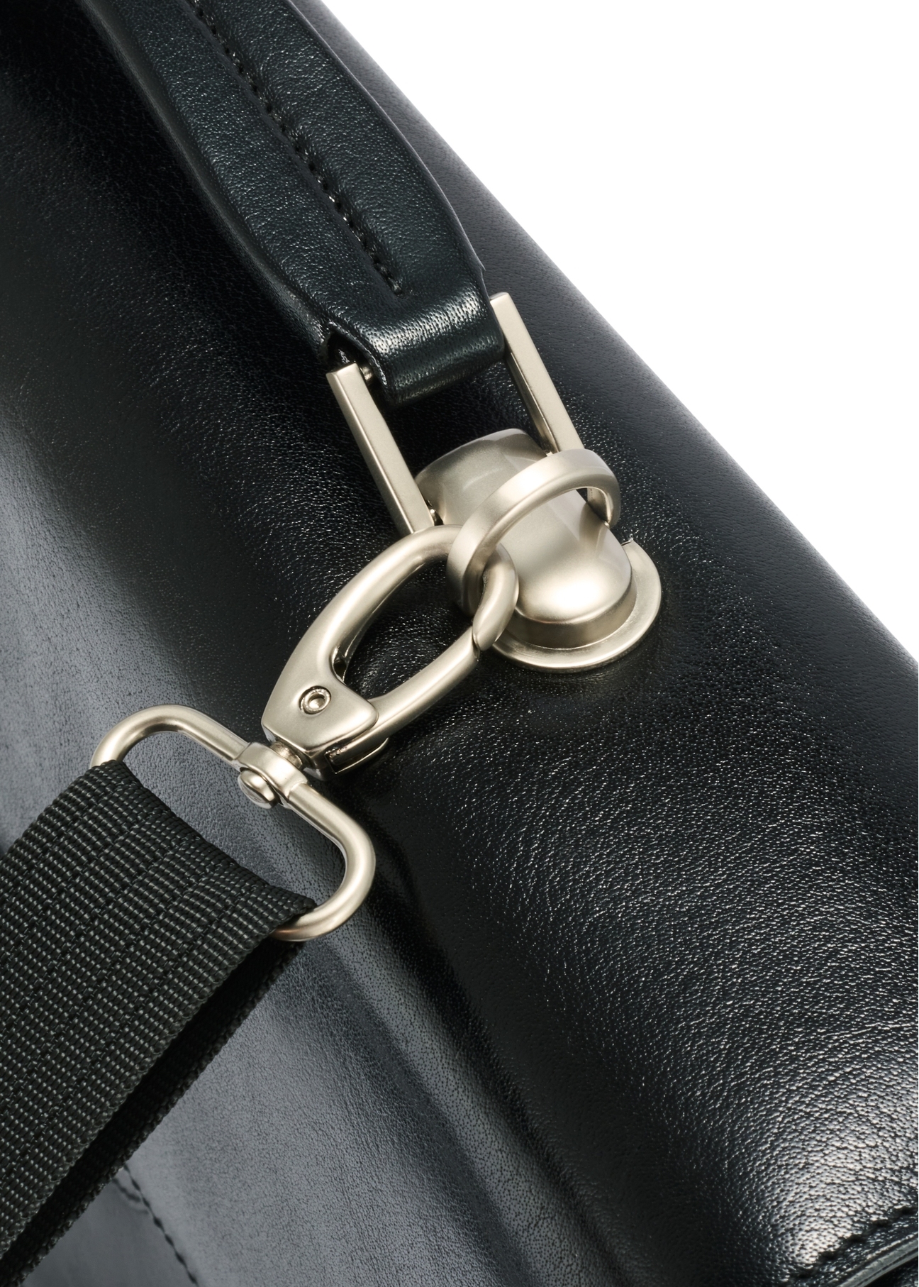 Men's leather briefcase TORMS-0478-99(Z25), close-up of the product buckle, view on a white background.
