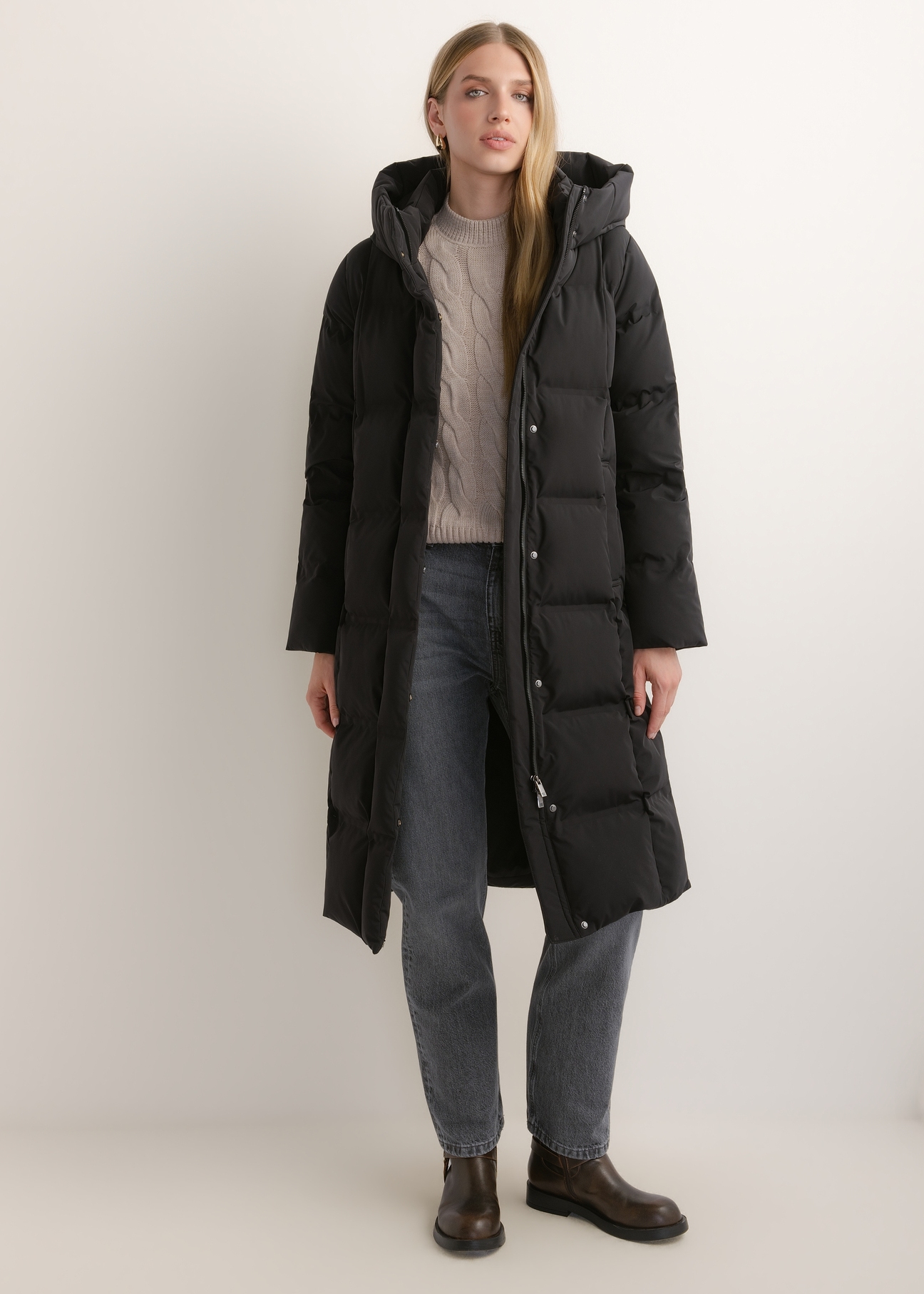 Black women's winter jacket KURDT-0699-99(Z26), front view of the product on a model. Full body visible.