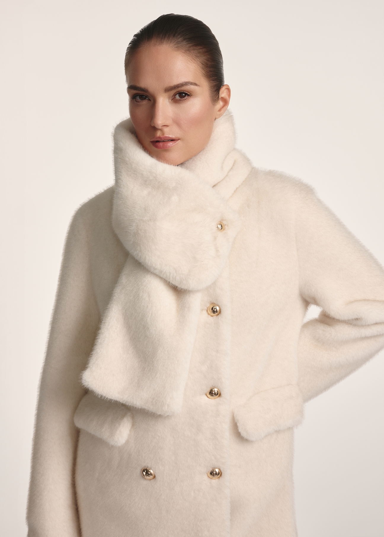 Long cream women's fur coat with scarf FUTDP-0069-12(Z25), close-up of the product detail on the model.