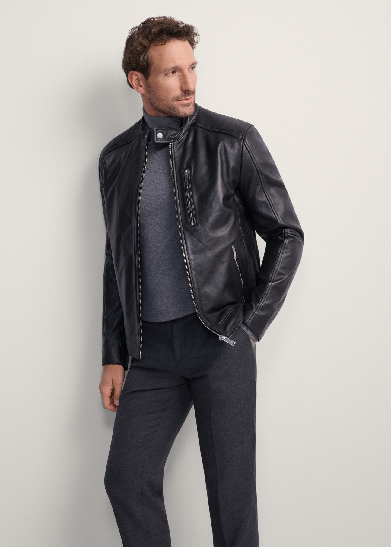 Men's leather jacket with stand-up collar KURMS-0191-5491(KS), front product view on model. Half silhouette visible.