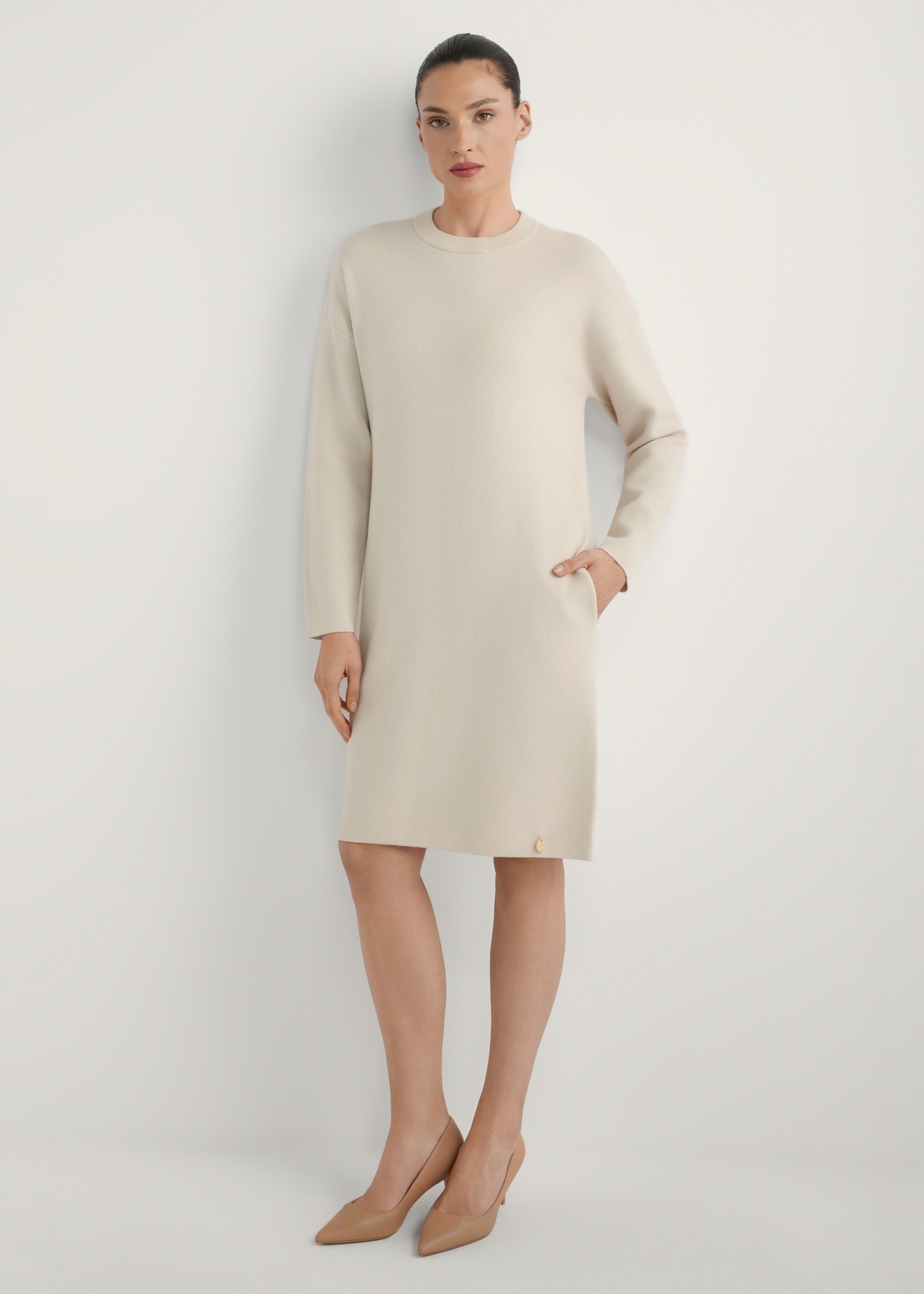 Beige women's dress SUKDT-0260-1A(W26), front view of the product on the model. Full body visible.