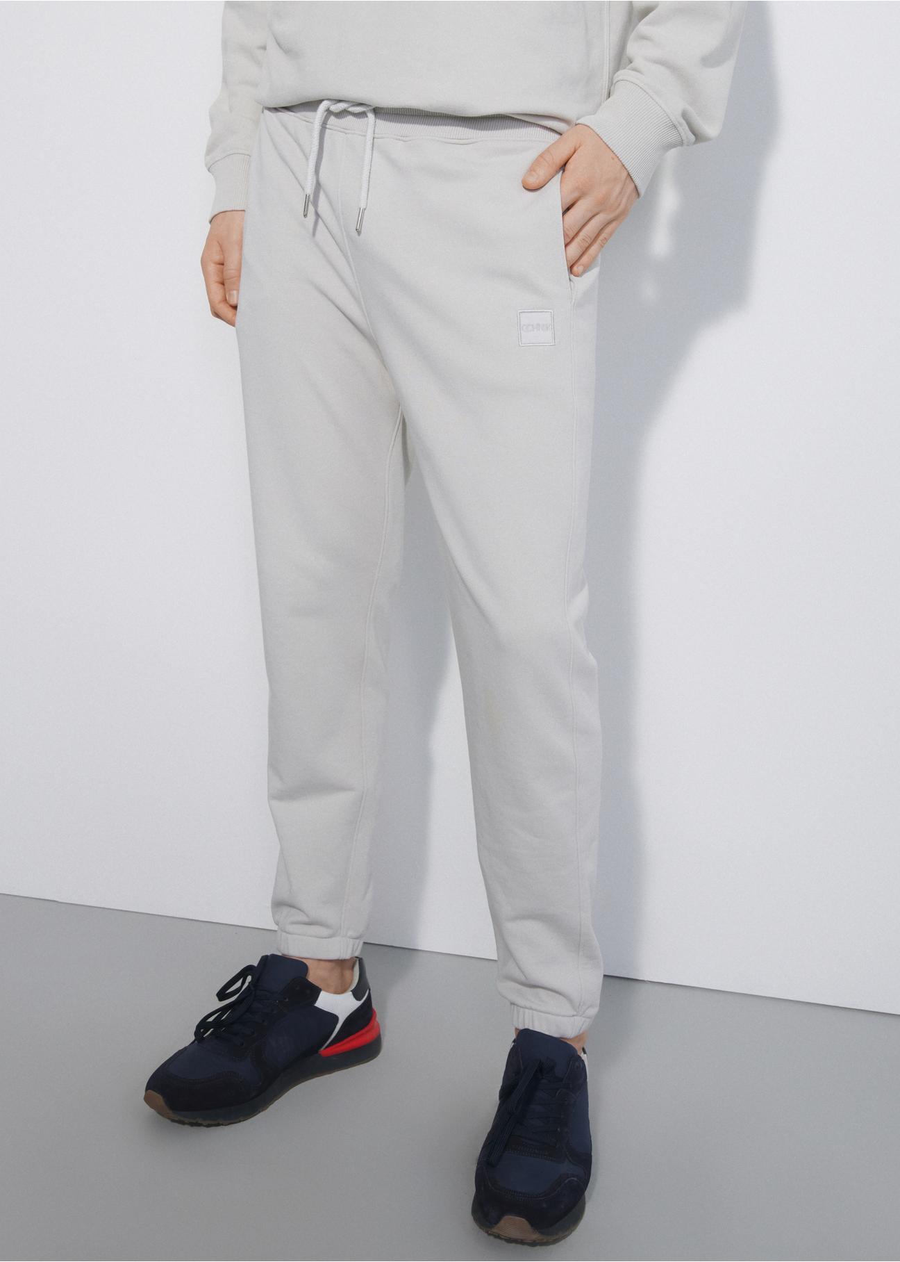 Cream men's sweatpants SPOMT-0085-66(W23)-01