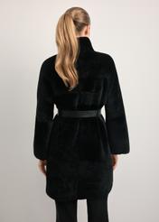 Women's black sheepskin coat with belt KOZDS-0035-5402(Z25) - back view of the product, on a white background. Knee-length silhouette visible.