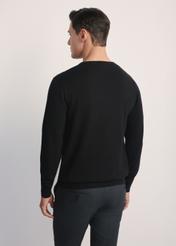 Black men's basic sweater SWEMT-0114A-99(Z24), view of the product from the back on the model, half of the silhouette visible.