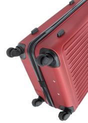 Medium suitcase on wheels WALAB-0082-4B-24(W26), close-up of the product wheels on a white background.