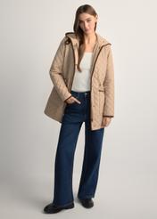 Beige women's quilted jacket KURDT-0646-1B(W26), front view of the product on the model. Full body visible.