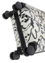 Small patterned suitcase on wheels WALAB-0074-1P-19(W26), view of the product wheels on a white background.