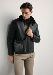 Men's leather messenger bag TORMS-0294A-99(Z25) - front view of the product, on a model, against a white background. Knee-length silhouette visible.