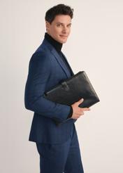 Black men's leather briefcase TORMS-0480-99(Z25), front view of the product on the model, half of the silhouette visible.