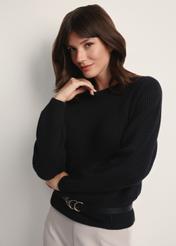 Black women's sweater SWEDT-0238-99(Z25), front view of the product on the model. Half of the silhouette visible.
