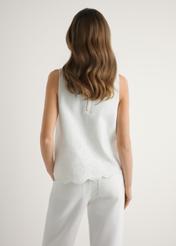 Women's white blouse BLUDT-0207-0B(W26), back view of the product on the model. Half of the silhouette visible.