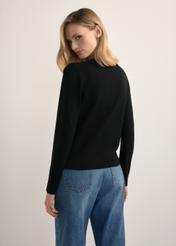 Black women's cardigan KARDT-0061-99(W26), back view of the product on the model. Half of the silhouette visible.