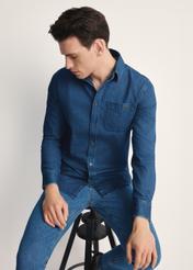 Blue men's denim shirt KOSMT-0348-61(Z25), product visible from the front on the model, half of the silhouette visible.