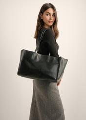 Black large leather women's handbag TORES-1435-99(Z26), front view of the product on the model's shoulder.