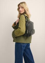 TORES-1378-99(Z26) women's black leather backpack, diagonal view of the product on the model. Half of the silhouette visible.