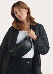 Black women's handbag TOREC-1050-99(Z25), front view of the product on the model, half of the silhouette visible.