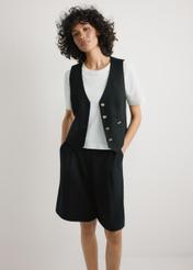 Black viscose and linen vest KAMDT-0038-99(W26) - front view of the product, on a model, on a light background, visible silhouette to the knees.