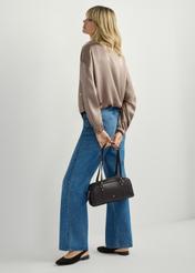 Dark brown TOREC-1233-1I(W26) shoulder bag, product view in model's hand. Full body visible.