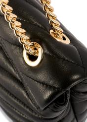 Women's leather handbag in black color TORES-1285-99(W26) - close-up of detail, on white background.