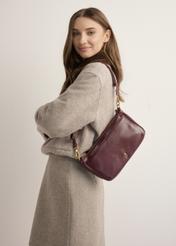 Burgundy women's shoulder bag TOREC-1245-4D(Z26), front view on model. Half silhouette visible.