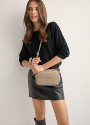 Small women's handbag in cool beige TOREC-1285-1K(Z26), front view of the product on a model. Half of the silhouette visible.