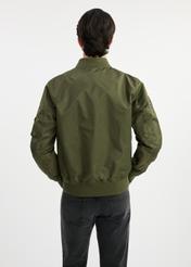Olive men's TOP GUN KURMT-0381-57(W25) bomber jacket - back view on model on white background. Half of the silhouette visible.