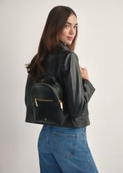 Small black women's backpack TOREC-1128-99(W26), product view from the front on a model, half of the silhouette visible.