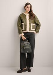TORES-1345-9I(Z26) women's black leather backpack, front view of the product on a model. Full body view.