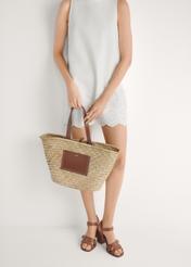 Women's camel leather sandals BUTYD-1177-1D(W26) - front view of the product, on a model, against a light background. Half of the silhouette visible.