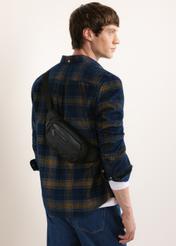 Black men's bag TORMN-0430-99(Z26), product view diagonally on the model. Half of the silhouette visible.