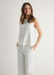 Women's white blouse BLUDT-0207-0B(W26), front view of the product on the model. Half of the silhouette visible.