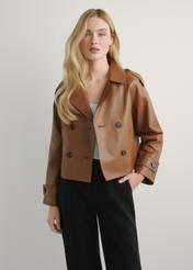 Women's oversized short leather jacket in camel color KURDS-0540-1D(W26), front view of the product on the model. Half of the silhouette visible.