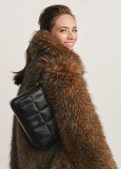 Black leather handbag TORES-1197-99(Z25) - front view of the product on a model against a white background. Half of the silhouette visible from the side.