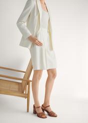 Women's suede camel sandals with a block heel BUTYD-1231-1D(W26), diagonal view of the product on the model's feet, on a light background.