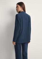 Women's navy blue blazer ZAKDT-0031A-7E(W26), back view of the product on the model. Half of the silhouette visible.