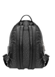 Black women's backpack with monogram TOREN-0280A-99(W25), product view from the back on white background.