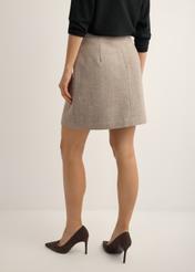 Light beige herringbone short skirt SPCDT-0132-1A(Z26), back view of the product on the model. Half of the silhouette visible.