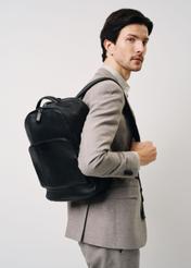 Large black leather men's backpack PLCMS-0020A-99(Z25) - product view on model, on white background. Half silhouette visible.