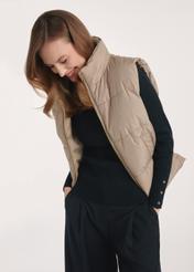 Dark beige women's vest KAMDT-0033-24(Z25), side view of the product on the model, half of the silhouette visible.