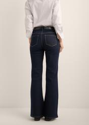 Women's dark navy blue jeans JEADT-0020-7E(Z26), back view of the product on the model. Half of the silhouette visible.