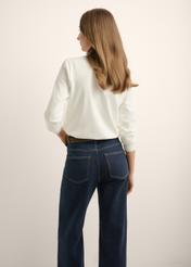 Women's cream cotton longsleeve LSLDT-0052-0B(Z26), back view of the product on the model. Half of the silhouette visible.
