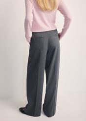 Gray women's trousers SPODT-0115-95(Z25), product view from the back on the model. Half of the silhouette visible.