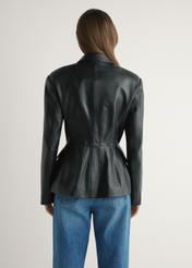 Women's black leather jacket KURDS-0600-99(W26) - back view of the product on a model, on a light background.