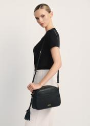 Black leather women's handbag TORES-0806E-99(Z25), front view of the product on the model, half of the silhouette visible.