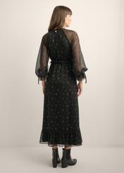 Black maxi dress with a lilac pattern and ruffles SUKDT-0290-9P(Z26), product view from the back on the model. Full body visible.