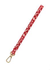 Red women's floral wallet POREC-0402-42(W25), view of the product strap on a white background.